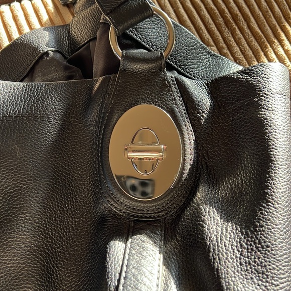 Stylish black Coach Penelope Hobo Leather handbag with silver hardware. - Picture 14 of 16